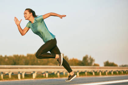 woman running hard and sweating